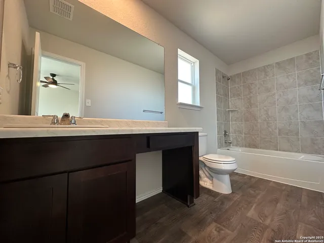 a view of a backyard of the house