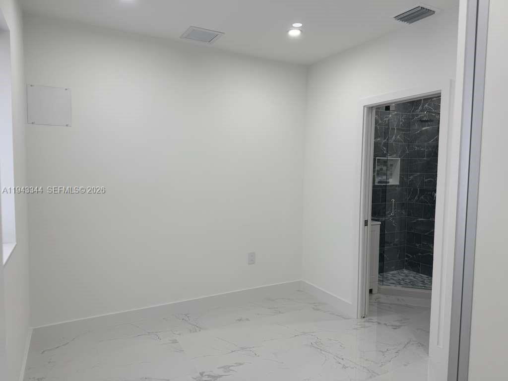 12970 Southwest 187th Street, Unit EFFICIENCY Miami, FL 33177 - Photo 18 of 30 a view of an empty room