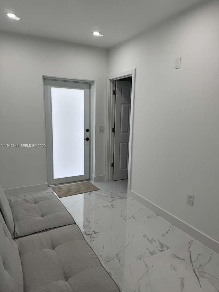 12970 Southwest 187th Street, Unit EFFICIENCY Miami, FL 33177 - Photo 28 of 30 a view of livingroom with a couch