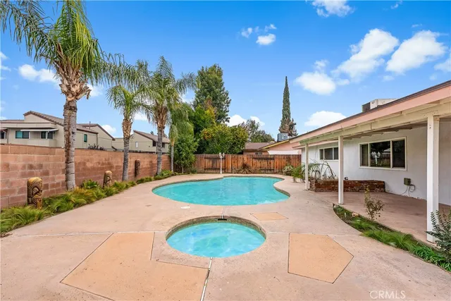 a view of a backyard with a patio