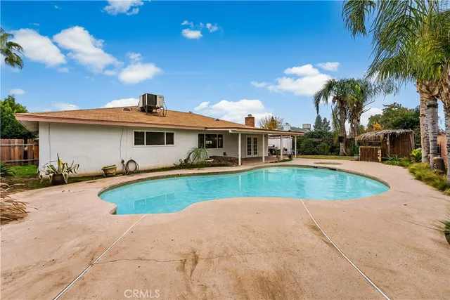 a view of a house with a swimming pool