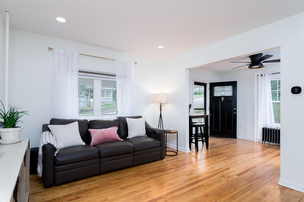 162 King Philip Road Worcester, MA 01606 - Photo 12 of 26 a living room with furniture and a large window