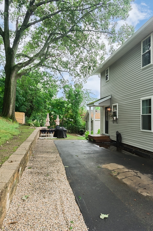 162 King Philip Road Worcester, MA 01606 - Photo 24 of 26 a view of a house with a yard and garage