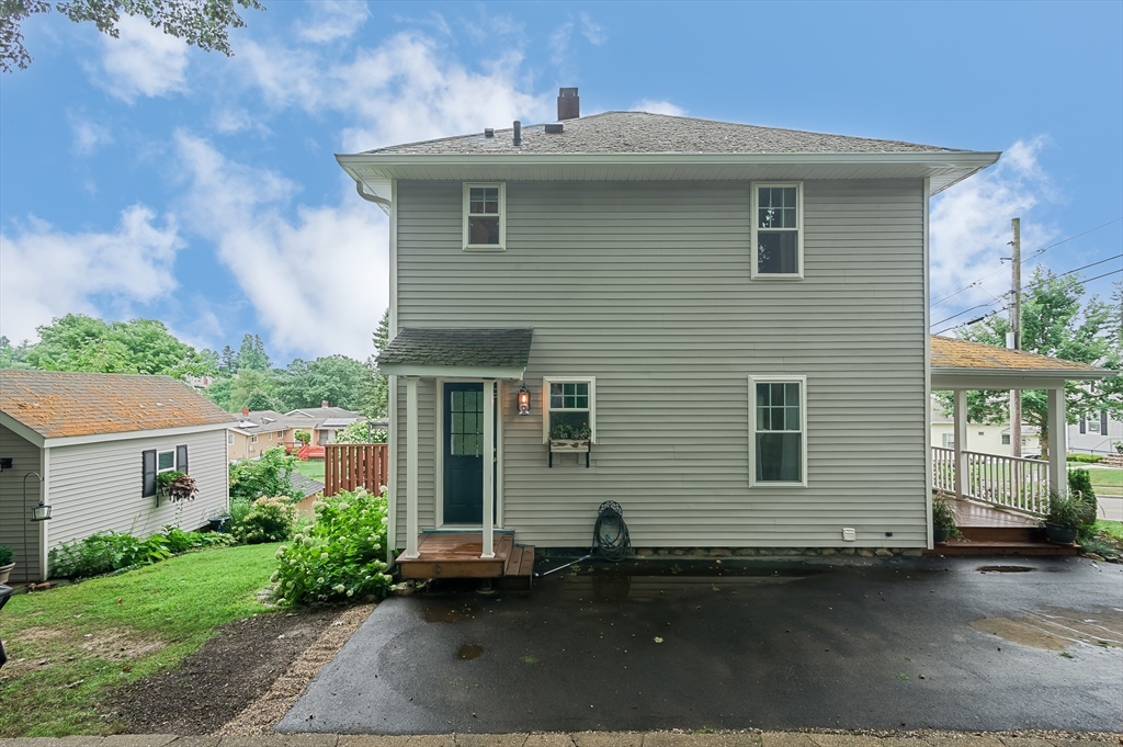 162 King Philip Road Worcester, MA 01606 - Photo 26 of 26 a front view of a house with a yard and a garage
