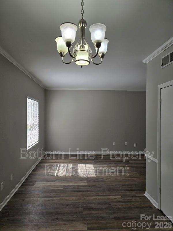 5949 Quail Hollow Road, Unit D Charlotte, NC 28210 - Photo 8 of 34 a view of a room with wooden floor
