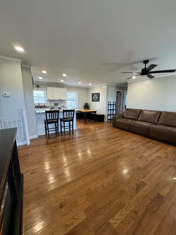 a living room with furniture and a table