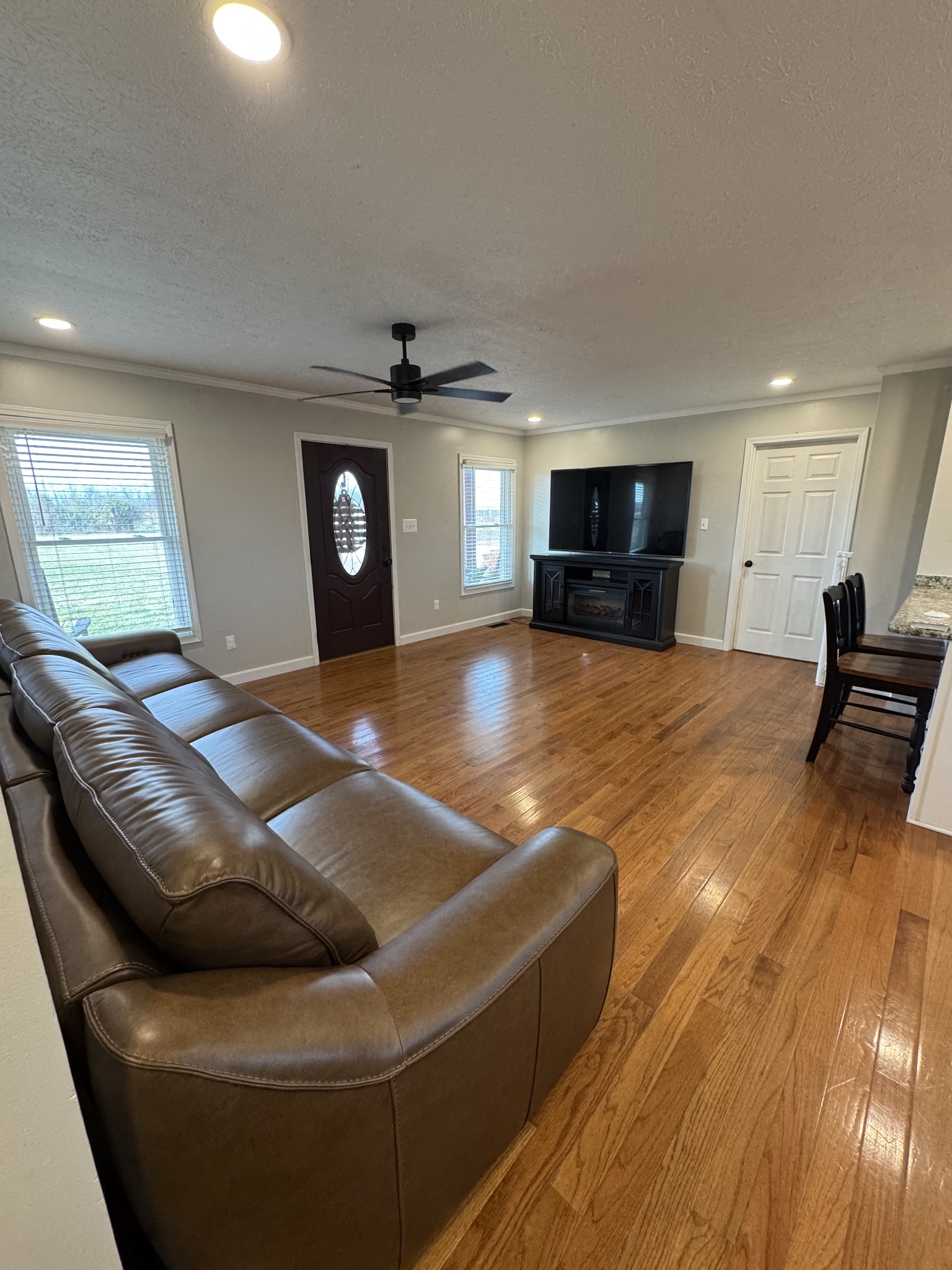 800 Pea Ridge-Sharon Grove Road Elkton, KY 42220 - Photo 17 of 43 a living room with furniture and a flat screen tv