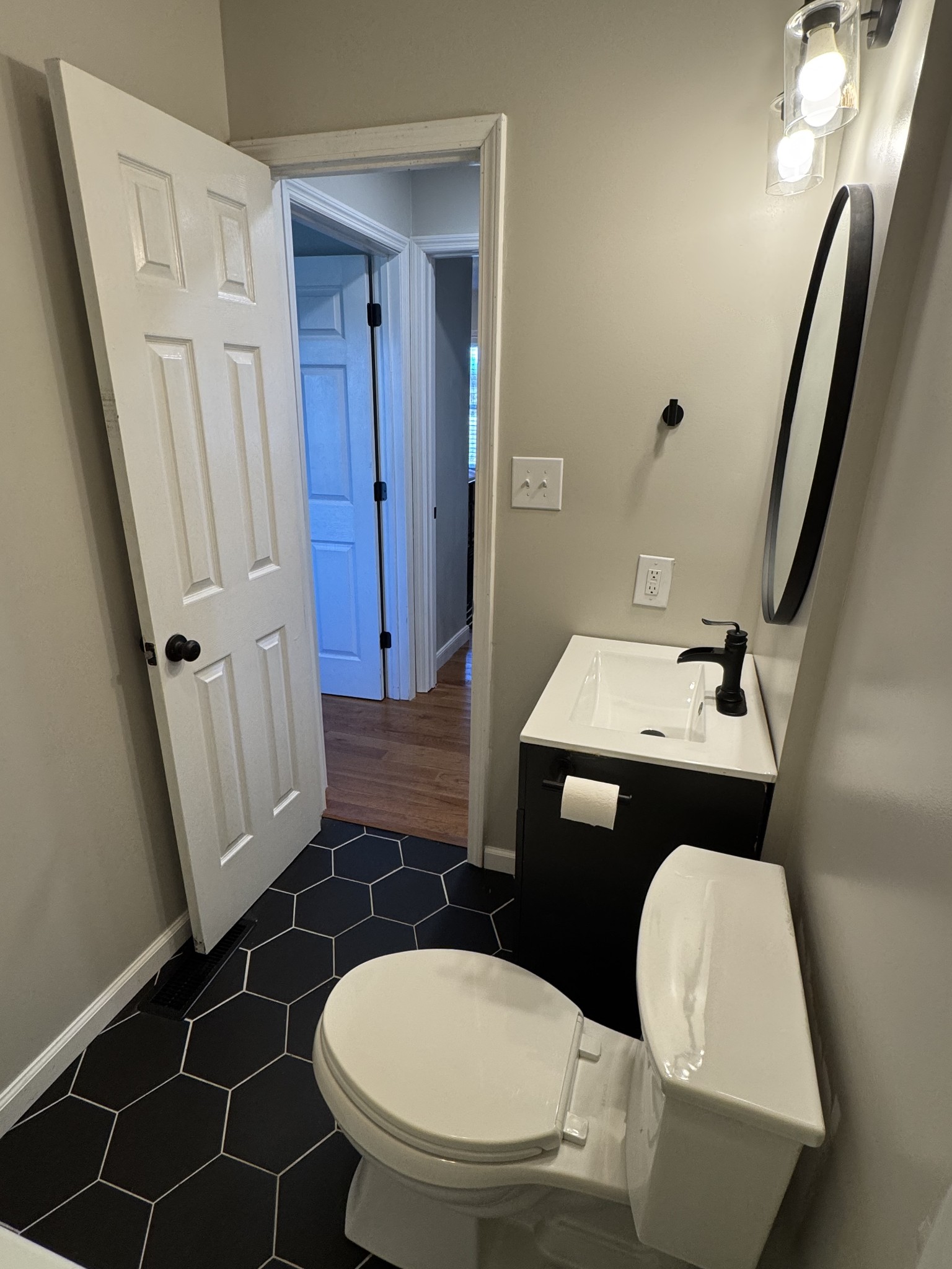 800 Pea Ridge-Sharon Grove Road Elkton, KY 42220 - Photo 20 of 43 a bathroom with a sink toilet and mirror