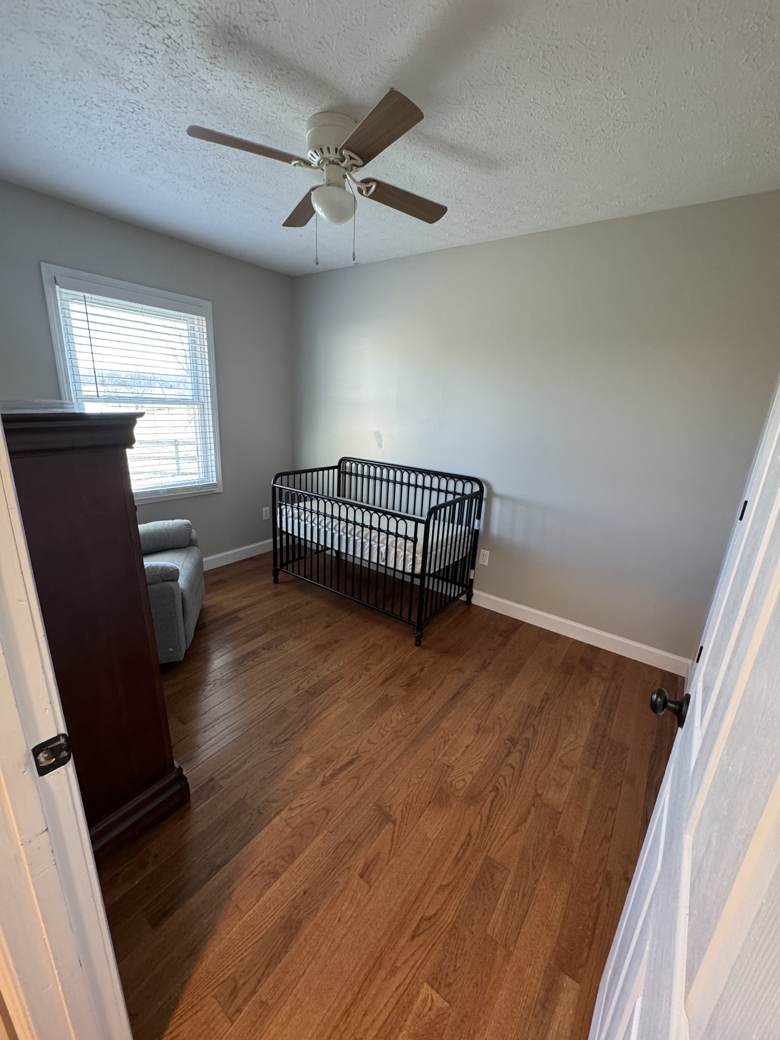 800 Pea Ridge-Sharon Grove Road Elkton, KY 42220 - Photo 25 of 43 wooden floor in an empty room with a window
