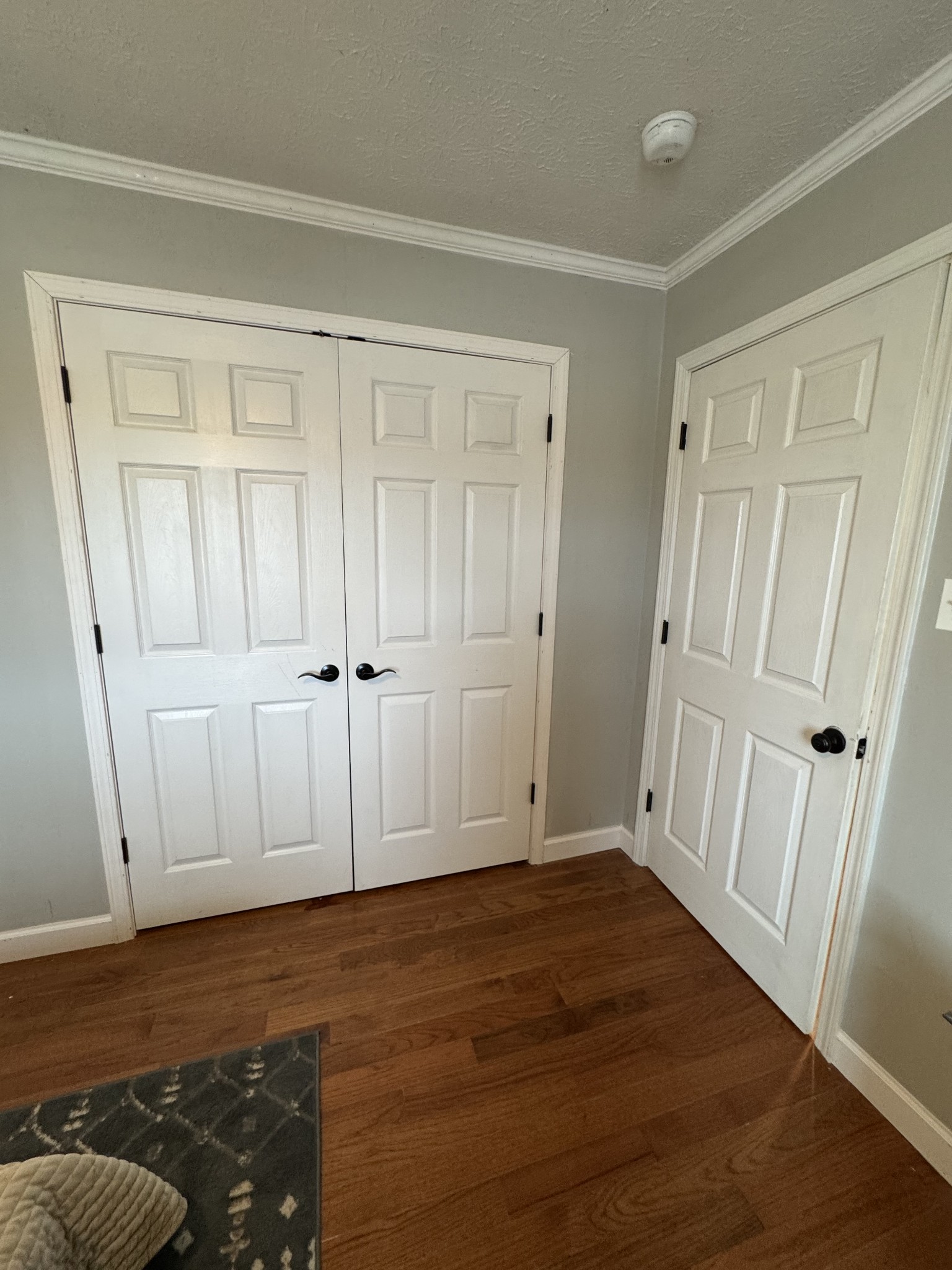 800 Pea Ridge-Sharon Grove Road Elkton, KY 42220 - Photo 33 of 43 an empty room with wooden floor and mirror