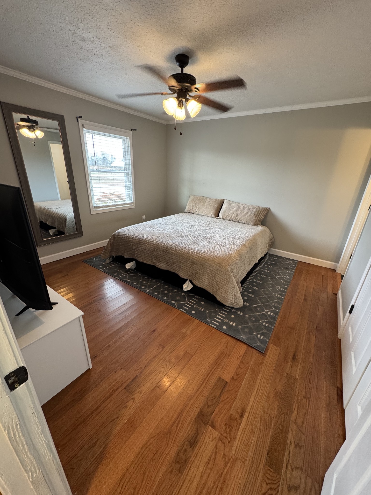 800 Pea Ridge-Sharon Grove Road Elkton, KY 42220 - Photo 34 of 43 a bedroom with a bed and window