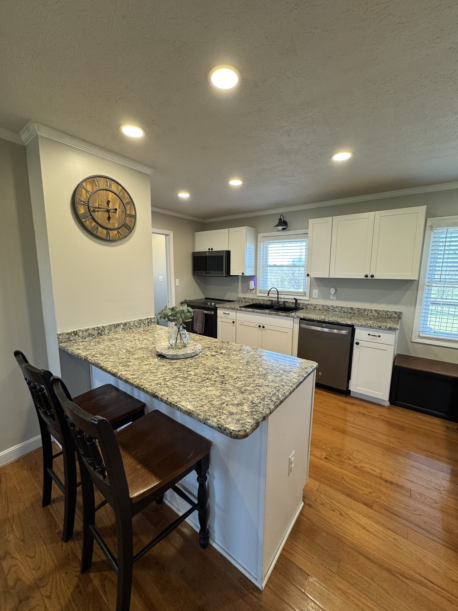 800 Pea Ridge-Sharon Grove Road Elkton, KY 42220 - Photo 4 of 43 a kitchen with kitchen island granite countertop wooden cabinets and counter space