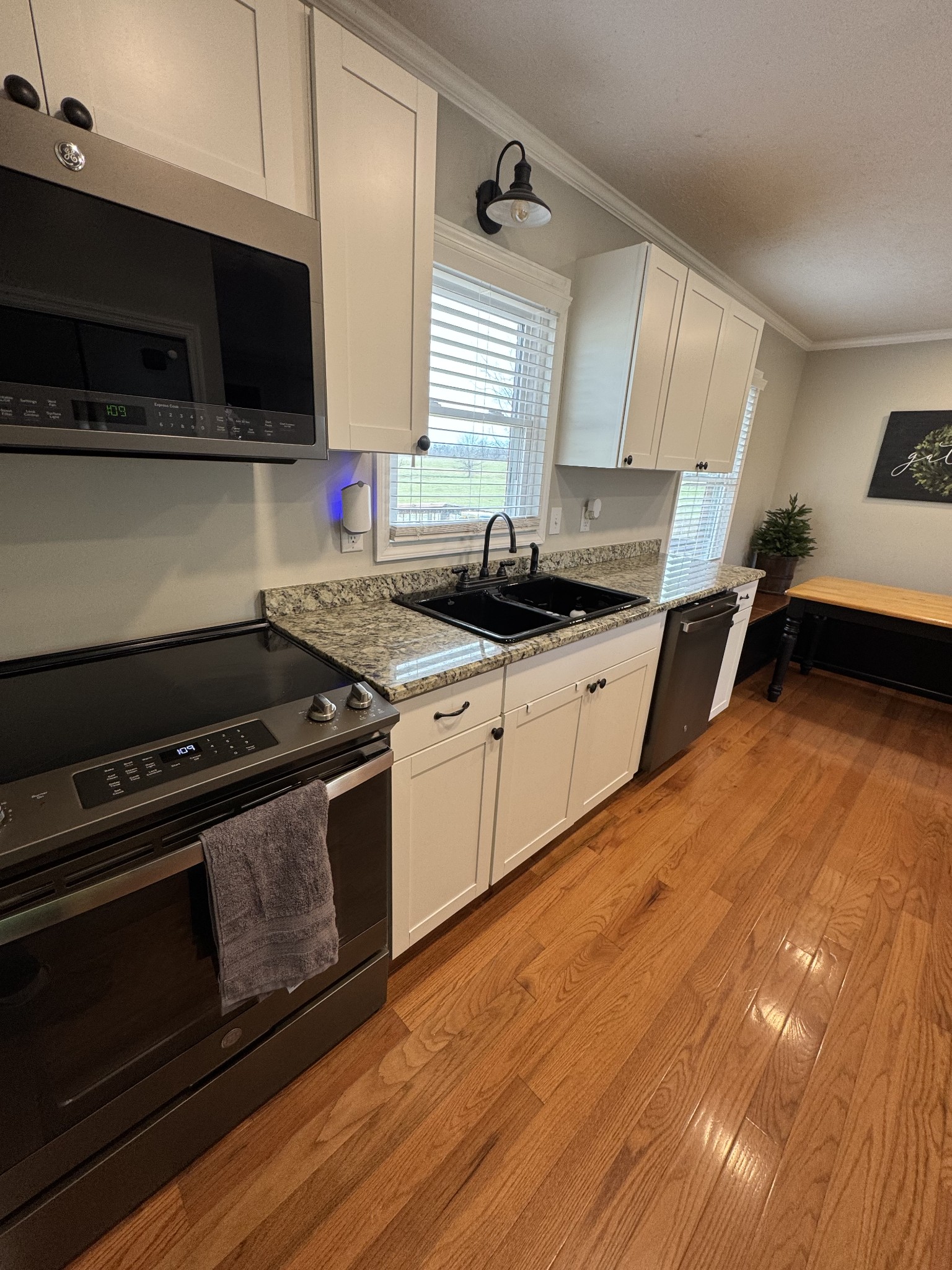 800 Pea Ridge-Sharon Grove Road Elkton, KY 42220 - Photo 8 of 43 a kitchen with stainless steel appliances a sink a stove and cabinets