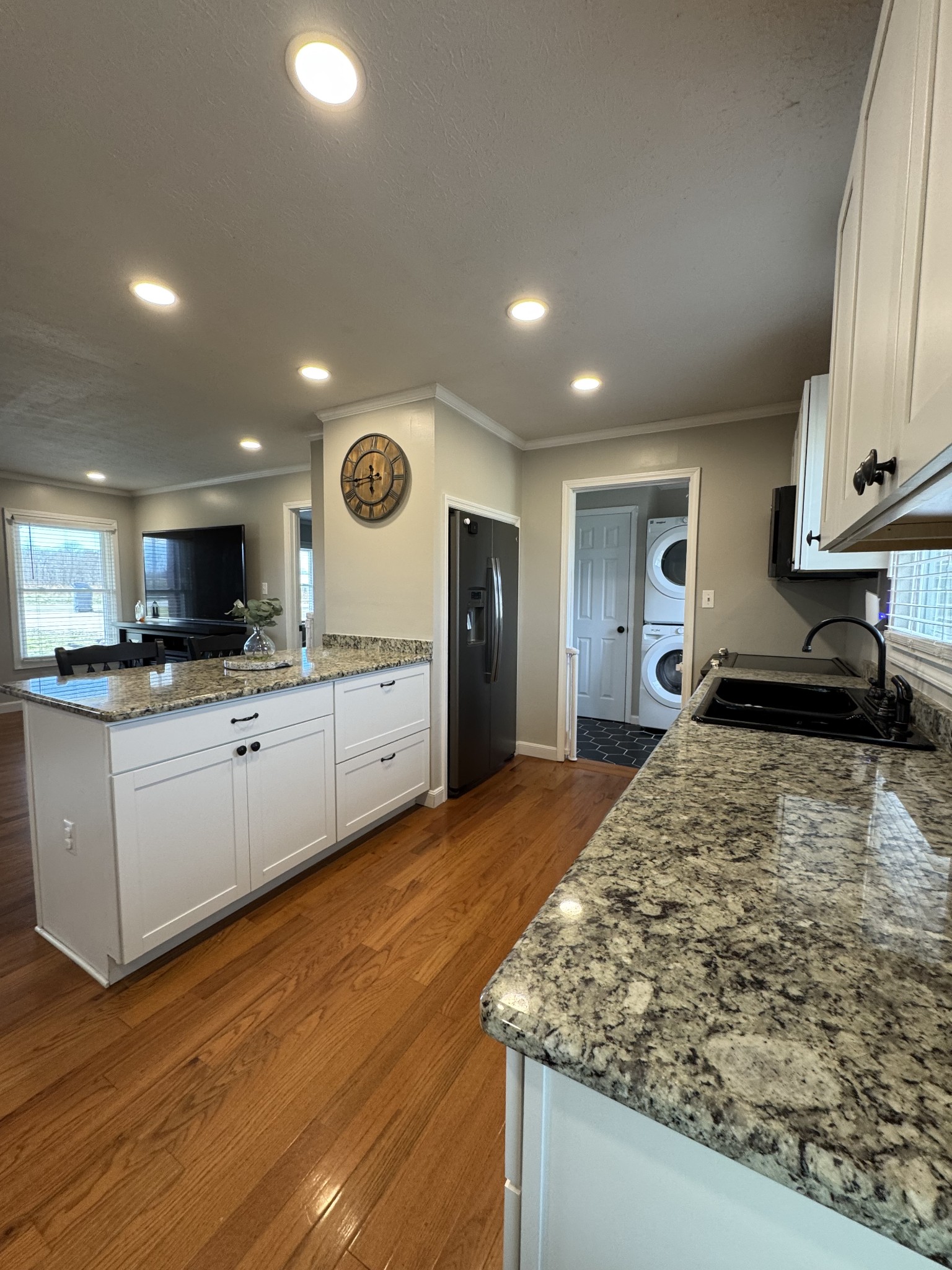 800 Pea Ridge-Sharon Grove Road Elkton, KY 42220 - Photo 9 of 43 a kitchen with stainless steel appliances granite countertop a sink and cabinets