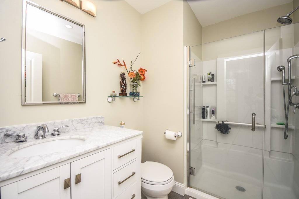 6 Edgehill Road Billerica, MA 01862 - Photo 18 of 24 a bathroom with a granite countertop sink toilet and shower