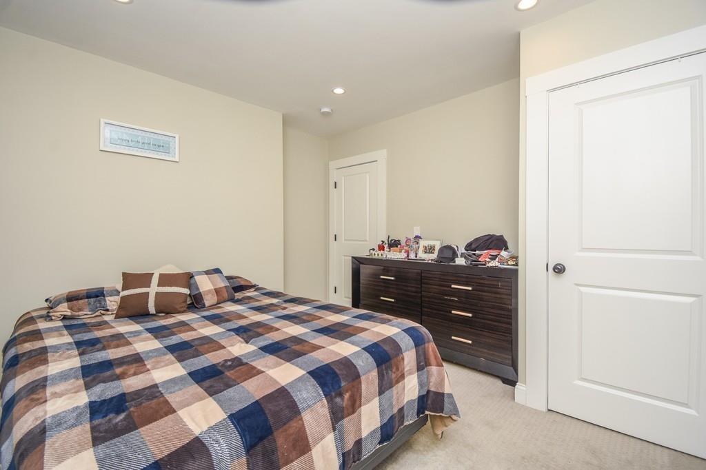 6 Edgehill Road Billerica, MA 01862 - Photo 19 of 24 a bedroom with a bed and a closet