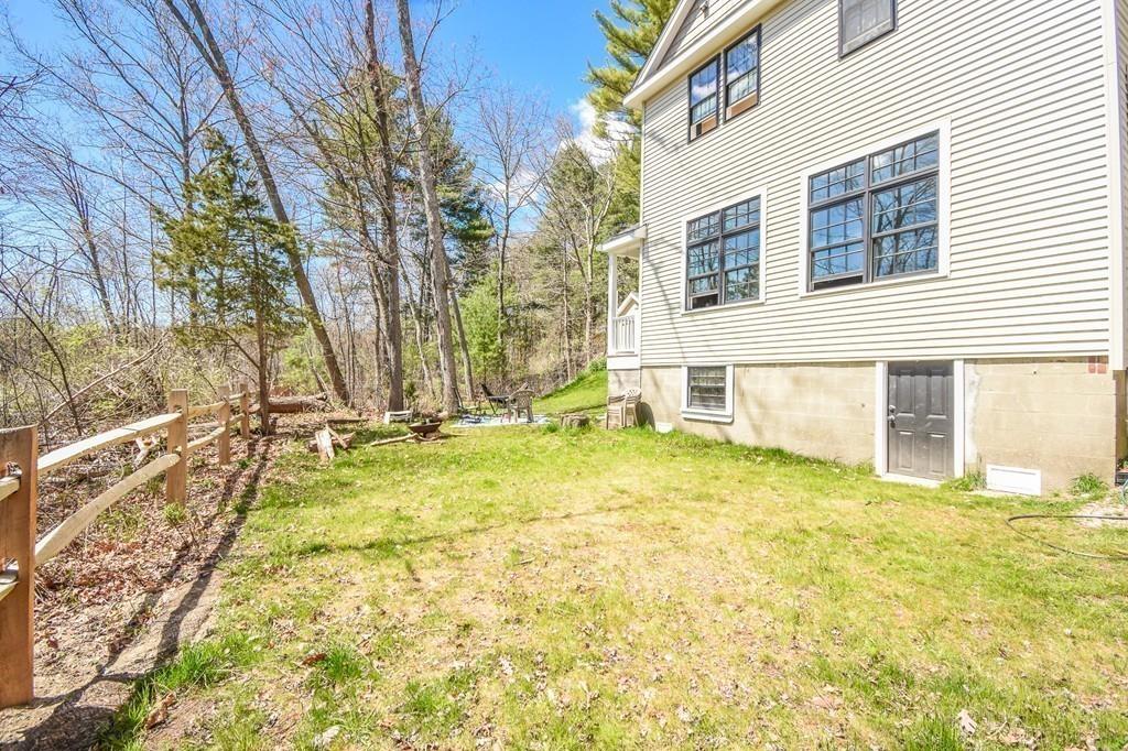 6 Edgehill Road Billerica, MA 01862 - Photo 23 of 24 a view of a house with a yard