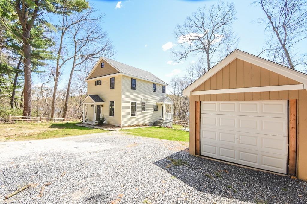 6 Edgehill Road Billerica, MA 01862 - Photo 6 of 24 a view of a house with a yard and large tree