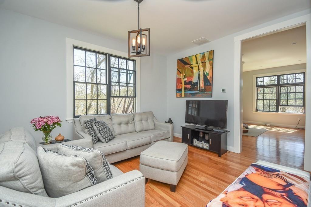6 Edgehill Road Billerica, MA 01862 - Photo 9 of 24 a living room with furniture and a flat screen tv
