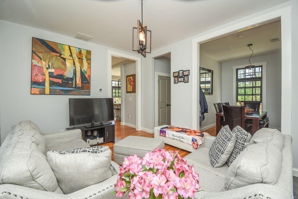 6 Edgehill Road Billerica, MA 01862 - Photo 10 of 24 a bedroom with furniture and a flat screen tv