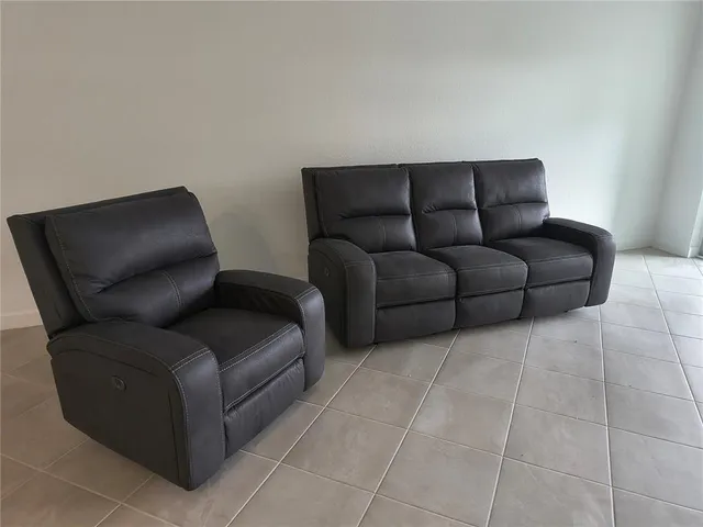 a living room with furniture and a couch