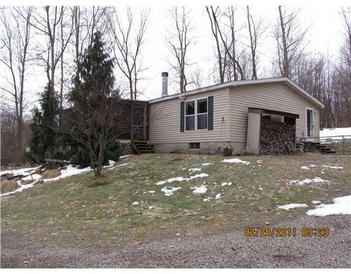 1207 Creek Road Sandy Lake, PA 16145 - Photo 2 of 18 Exterior Front. Home is on 1.79 acres right across from Lake Wilhelm and Goddard State Park...a great fishing lake !!!