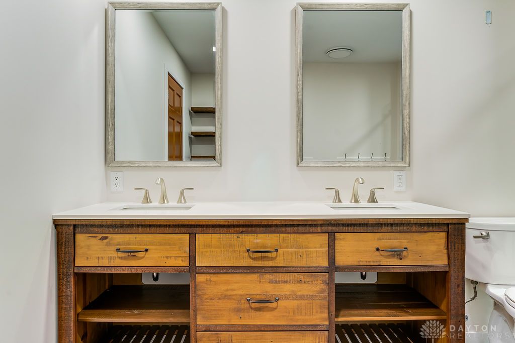 7400 Cook-Jones Road Waynesville, OH 45068 - Photo 32 of 72 This functional bathroom features a dual vanity, providing ample space and convenience for daily routines.