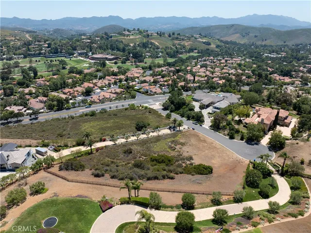 an aerial view of residential house with outdoor space