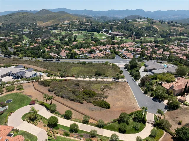 an aerial view of residential house with outdoor space and river