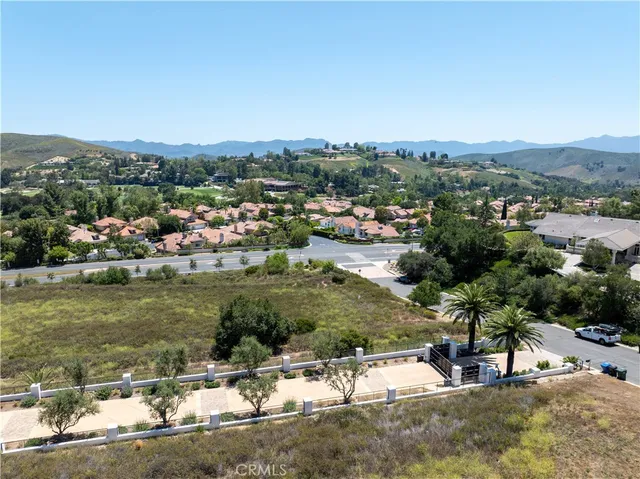 an aerial view of residential house with outdoor space