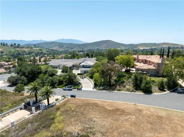 an aerial view of residential house with outdoor space