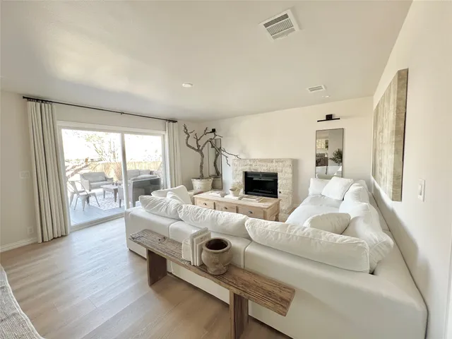 a en suite bathroom with double sink and a mirror