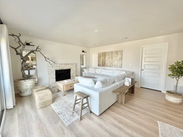 a bathroom with double sink and a mirror