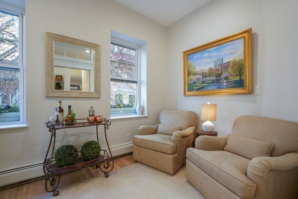 43 Anderson Street, Unit 1 Boston, MA 02114 - Photo 13 of 36 a living room with furniture and a window