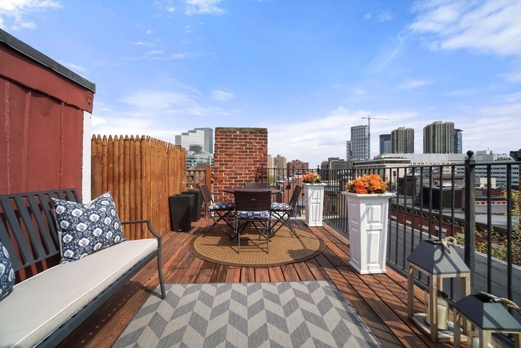 43 Anderson Street, Unit 1 Boston, MA 02114 - Photo 26 of 36 a view of a roof deck with furniture