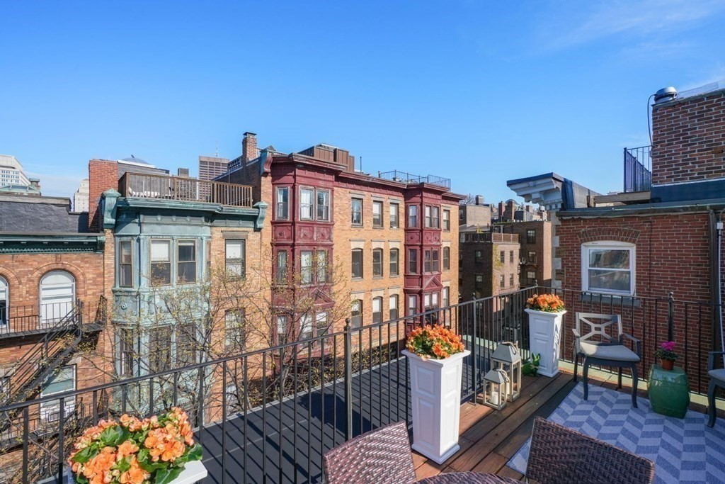 43 Anderson Street, Unit 1 Boston, MA 02114 - Photo 27 of 36 a view of buildings from the balcony