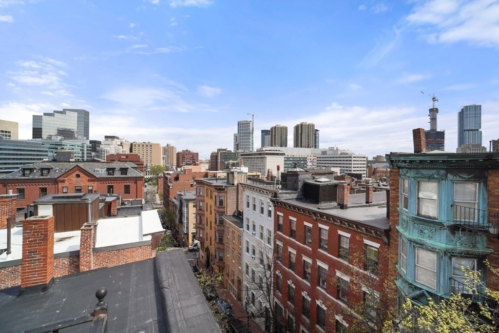 43 Anderson Street, Unit 1 Boston, MA 02114 - Photo 28 of 36 a view of a city with tall buildings