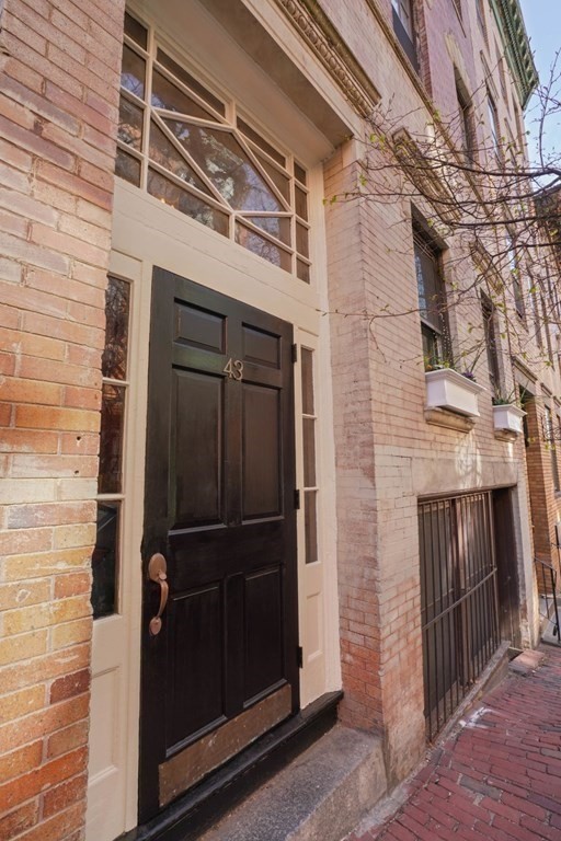 43 Anderson Street, Unit 1 Boston, MA 02114 - Photo 35 of 36 a view of front door
