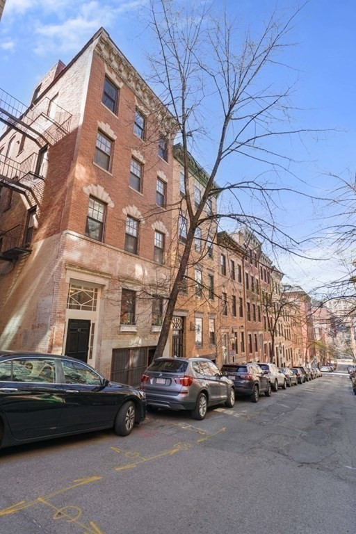 43 Anderson Street, Unit 1 Boston, MA 02114 - Photo 36 of 36 a car parked in front of a building