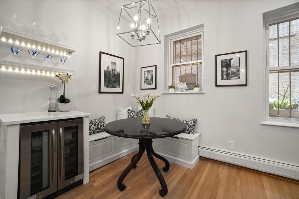 43 Anderson Street, Unit 1 Boston, MA 02114 - Photo 7 of 36 a living room with furniture and a chandelier