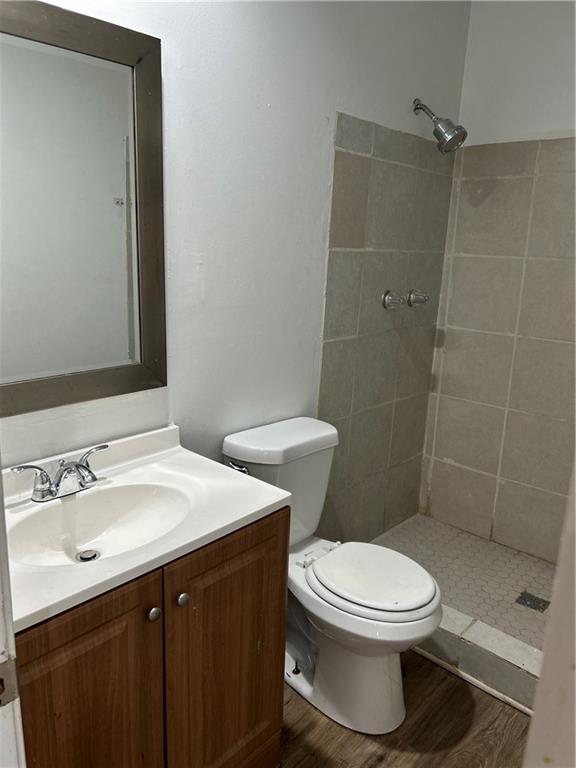 3637 Windmill Road Ellenwood, GA 30294 - Photo 4 of 6 a bathroom with a sink a toilet and shower