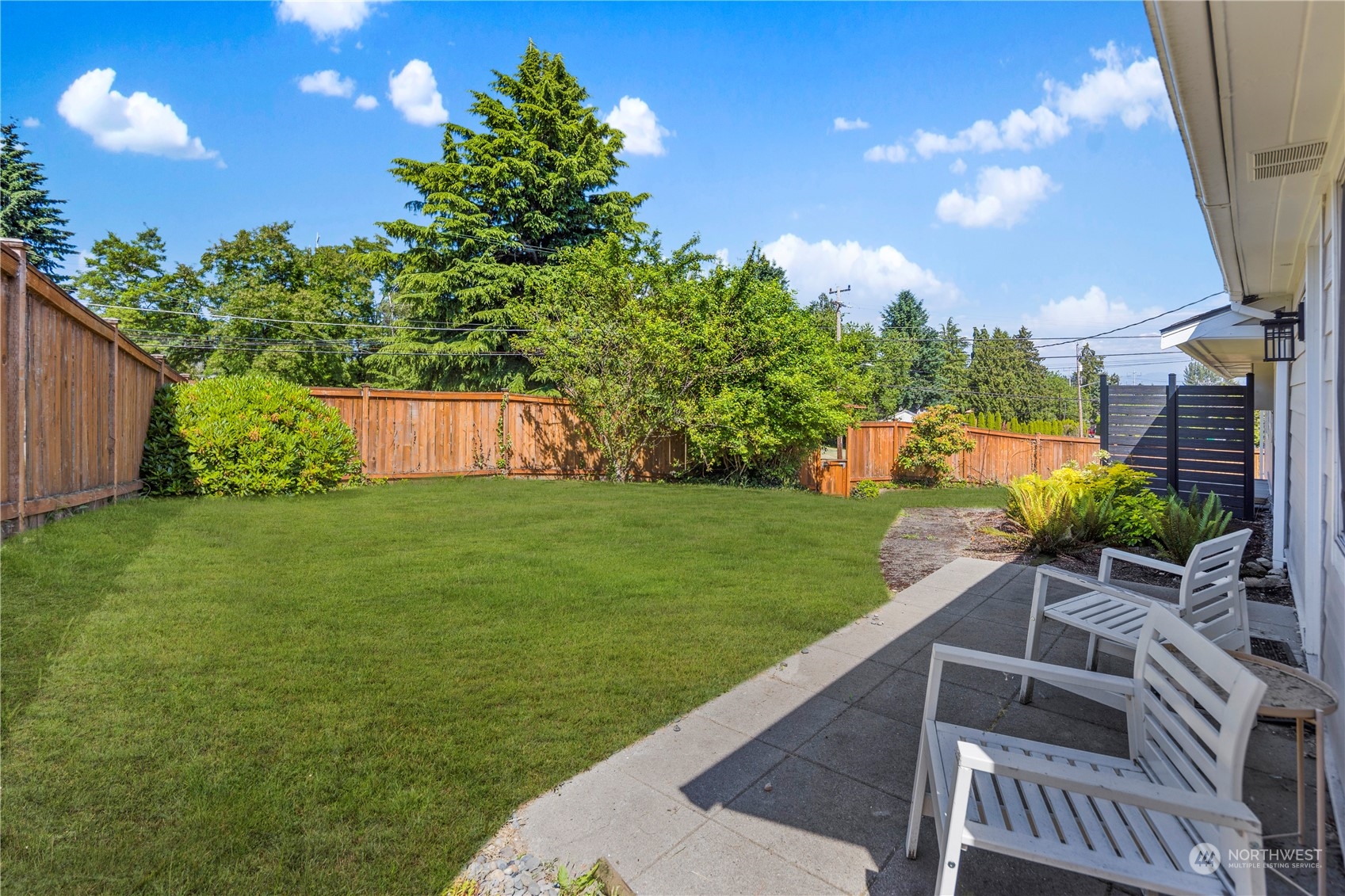 7728 South 128th Street Seattle, WA 98178 - Photo 27 of 31 a view of a backyard with a garden