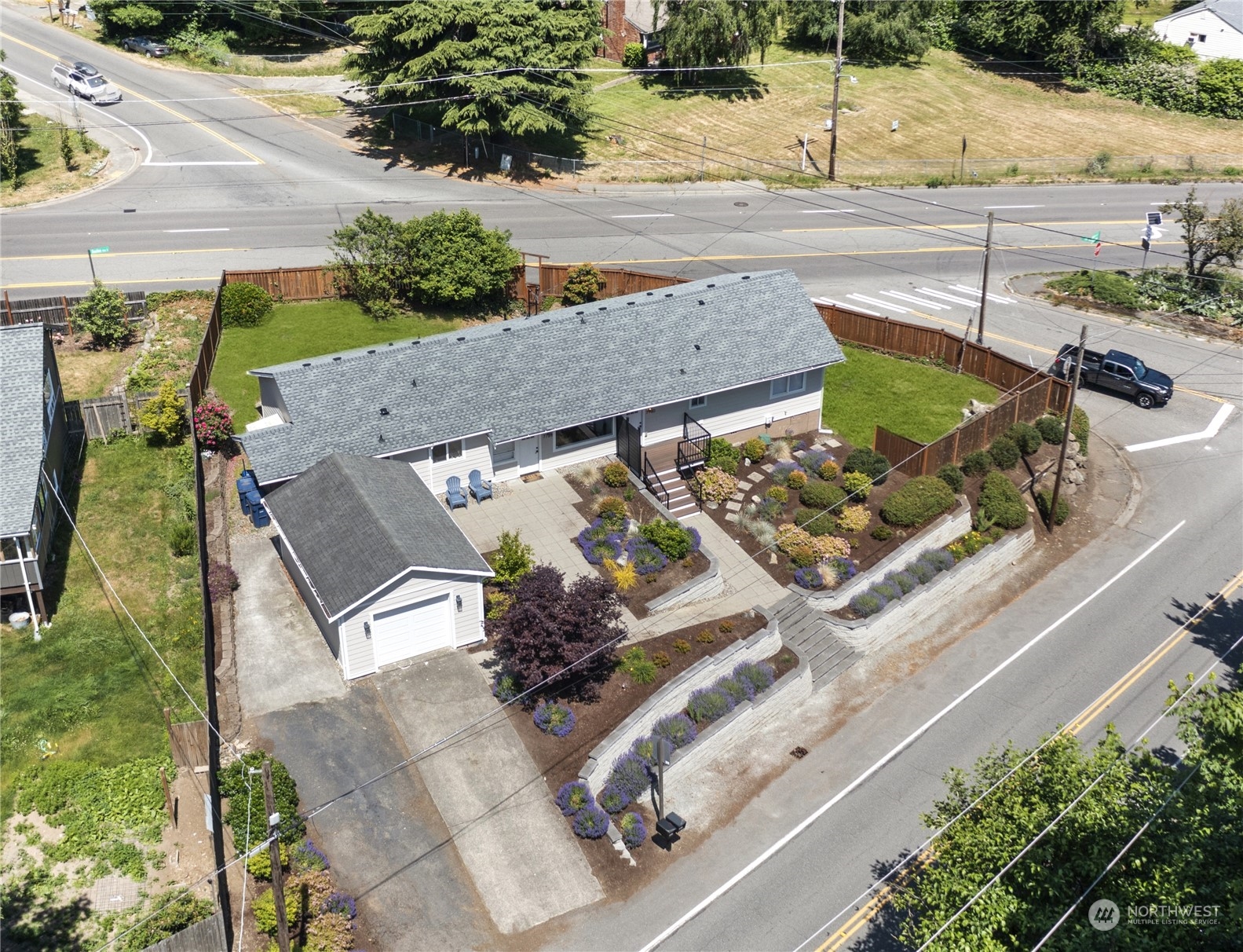 7728 South 128th Street Seattle, WA 98178 - Photo 30 of 31 an aerial view of a house with a yard basket ball court and outdoor seating