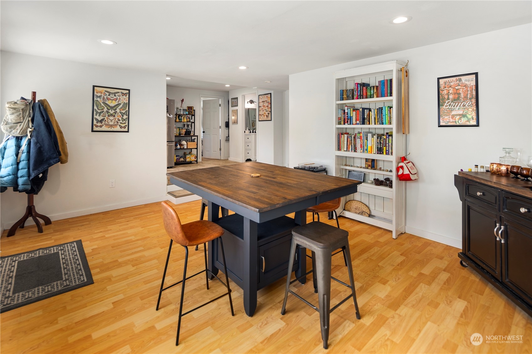 7728 South 128th Street Seattle, WA 98178 - Photo 5 of 31 a view of a dining room with furniture and wooden floor