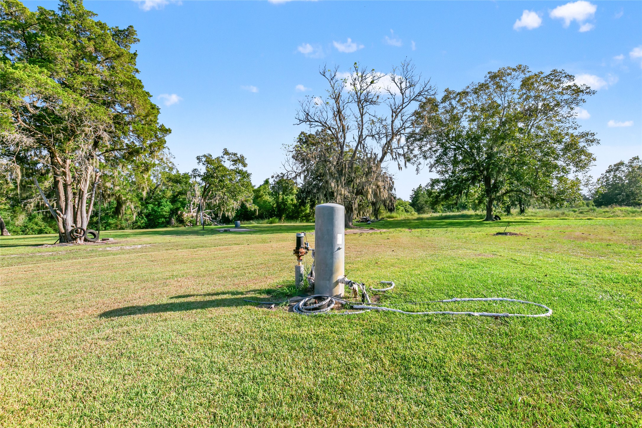 3014 Farm To Market 524 Road Sweeny, TX 77480 - Photo 9 of 18 A separate concrete RV/trailer pad has its own septic system, with a well shared between the pad and house. Two driveways and the layout provide natural separation between the two areas.