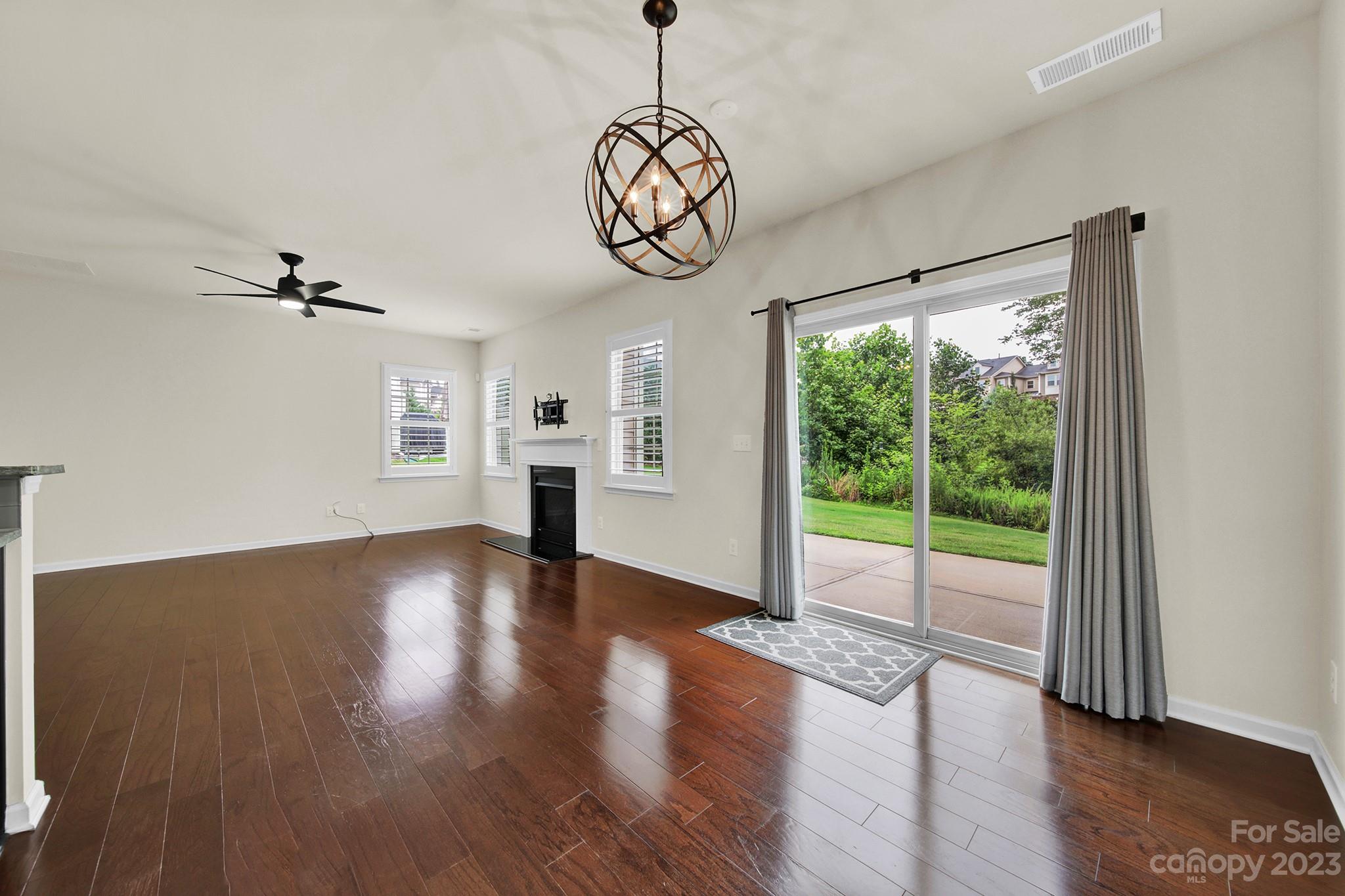 241 Butterfly Place Tega Cay, SC 29708 - Photo 14 of 42 a view of an entryway with wooden floor