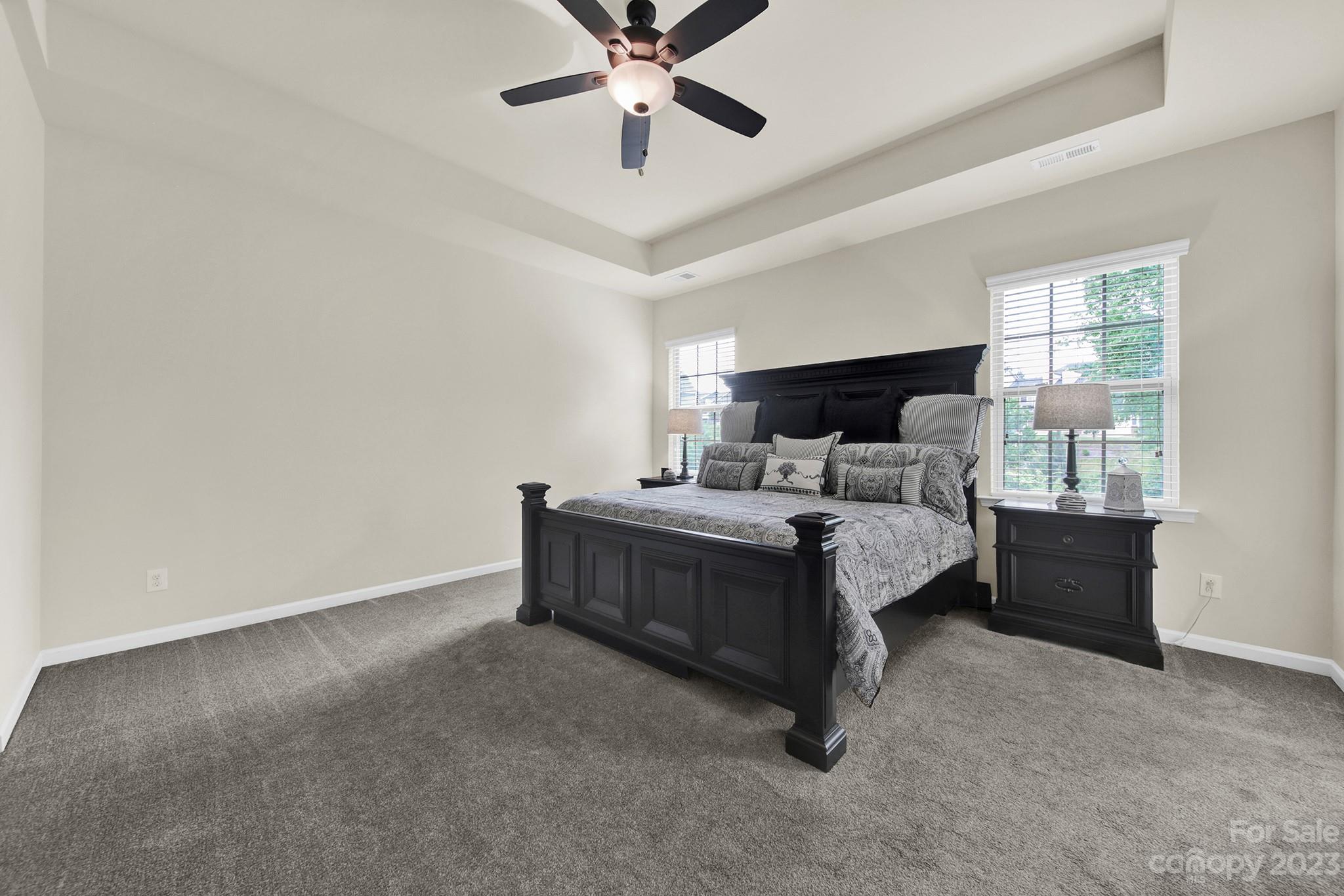 241 Butterfly Place Tega Cay, SC 29708 - Photo 25 of 42 a bed room with a bed and a window