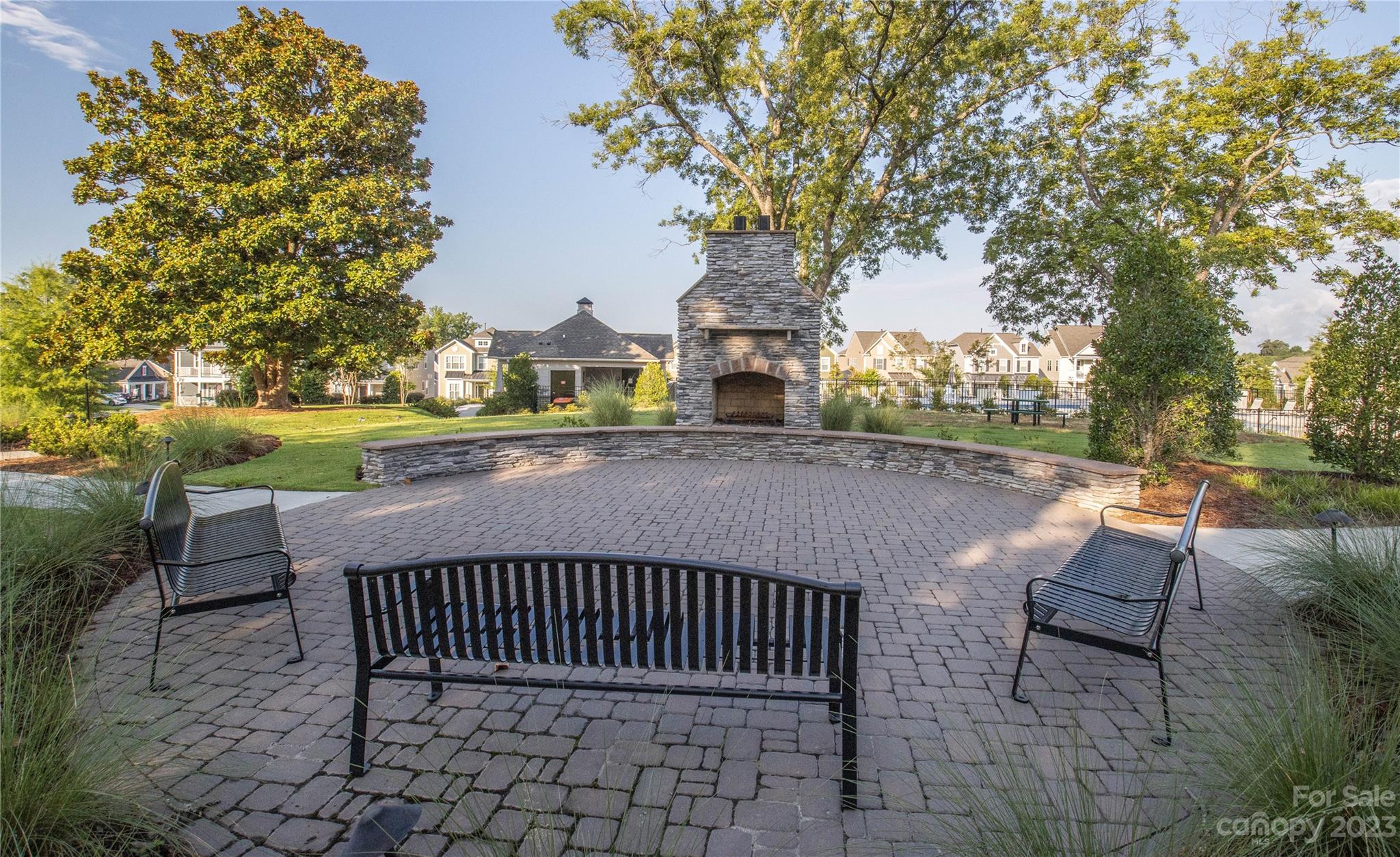 241 Butterfly Place Tega Cay, SC 29708 - Photo 39 of 42 a view of a patio with iron fence