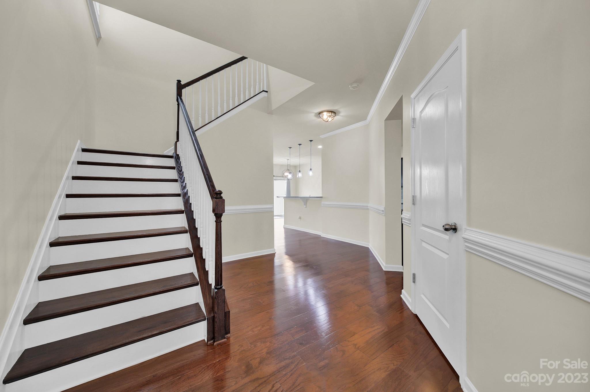 241 Butterfly Place Tega Cay, SC 29708 - Photo 4 of 42 a view of entryway with wooden floor