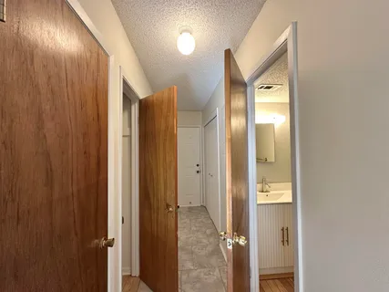 a bathroom with a sink and mirror
